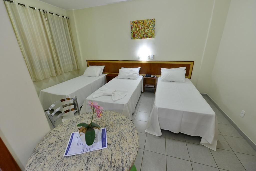 Quarto Triplo com Banheiro Privativo