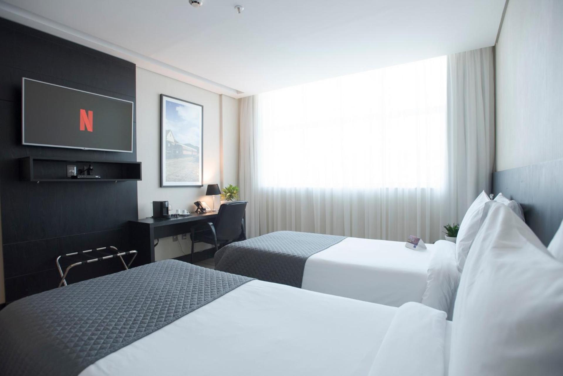 Quarto com 2 Camas de Solteiro Premium - Não-Fumantes