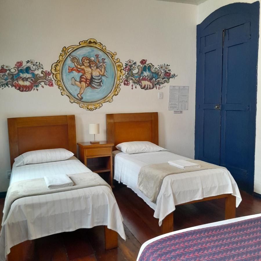 Suíte Deluxe com janela para o pátio