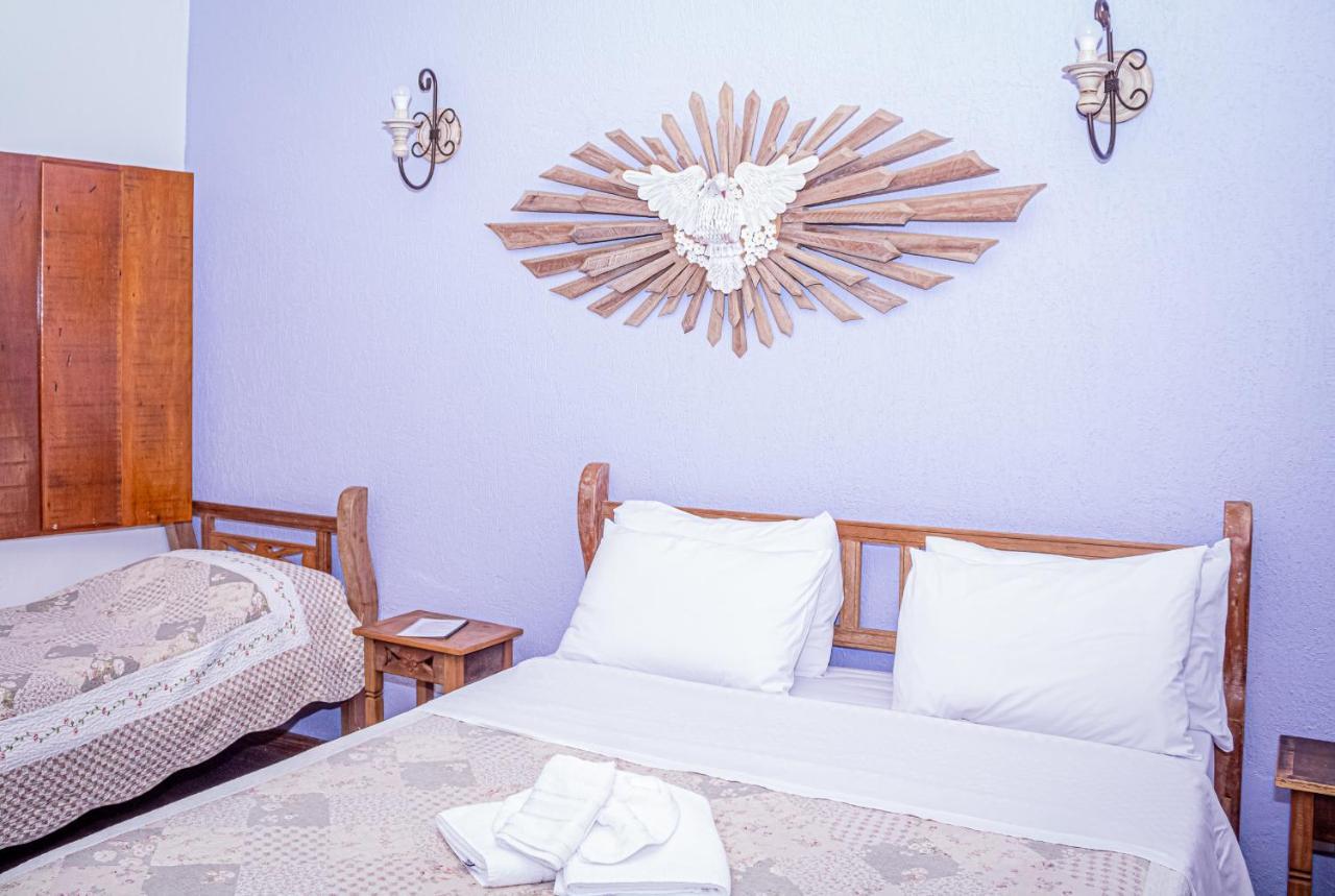 Quarto Triplo com Vista do Jardim