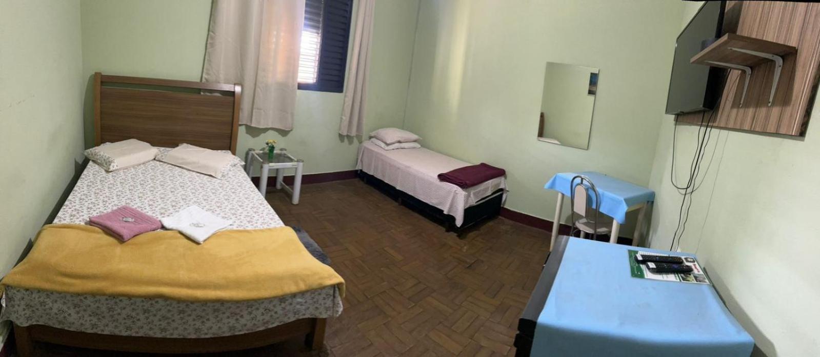 Quarto Quádruplo com Banheiro Privativo