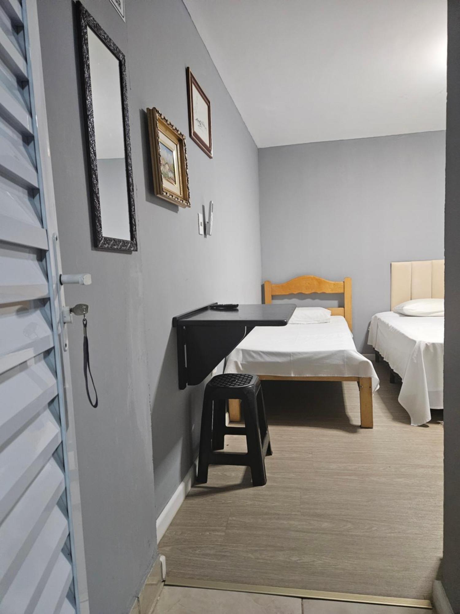 Quarto Triplo Executivo