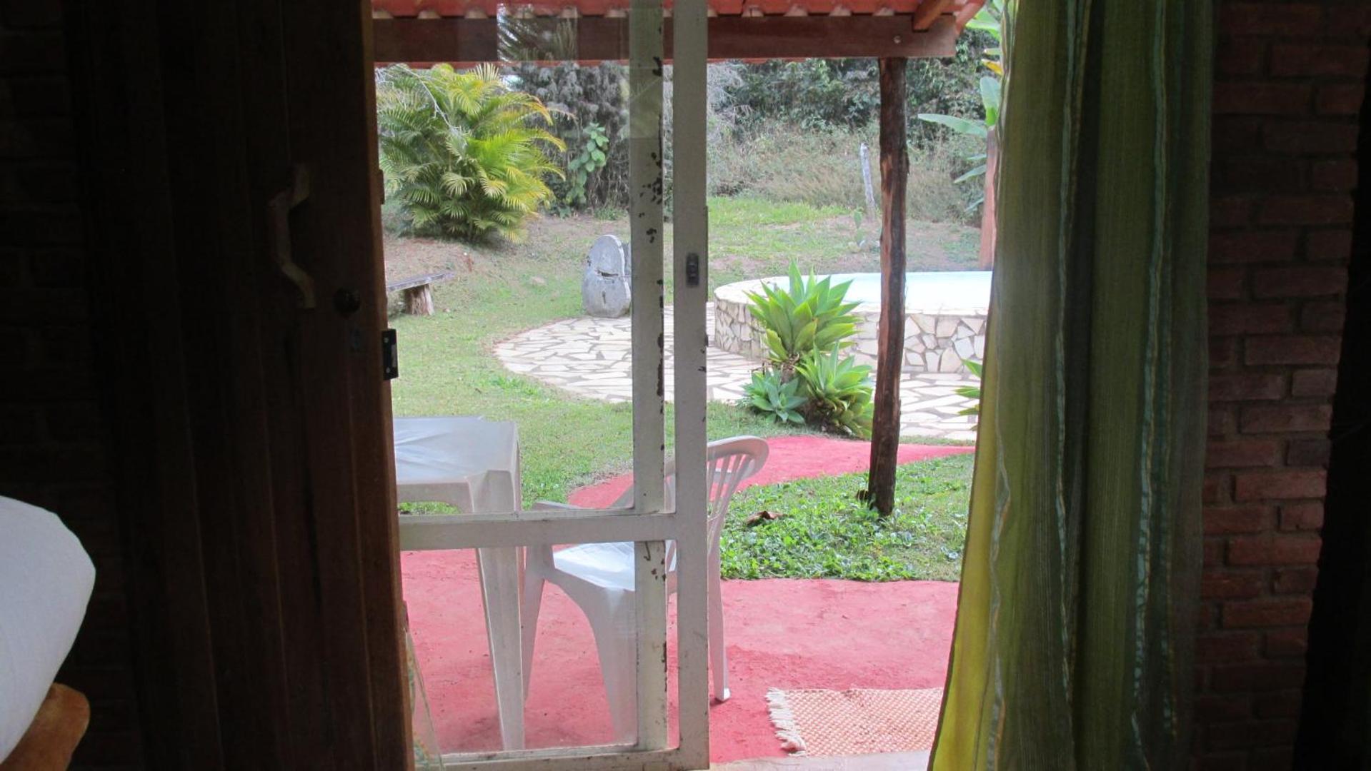 Suíte com Vista para a Piscina