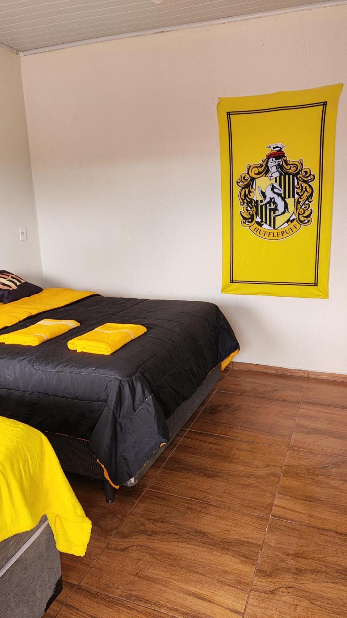 Quarto Triplo com Banheiro Privativo