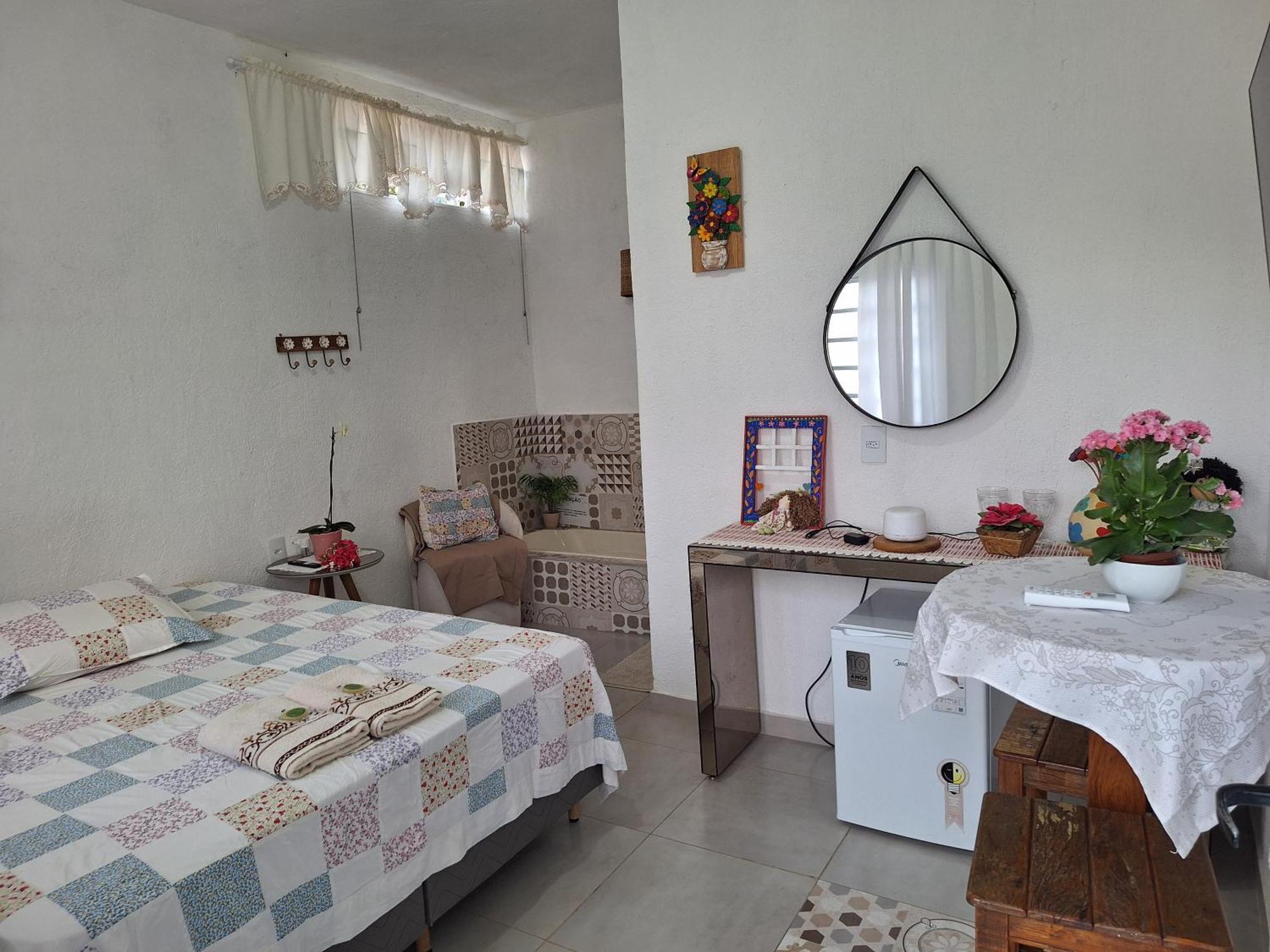 Quarto Duplo com Banheira de Hidromassagem