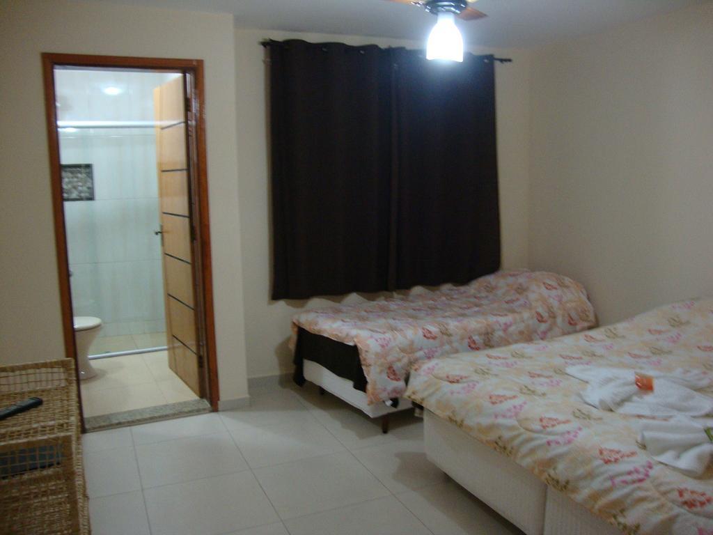 Quarto Triplo com Banheiro Privativo
