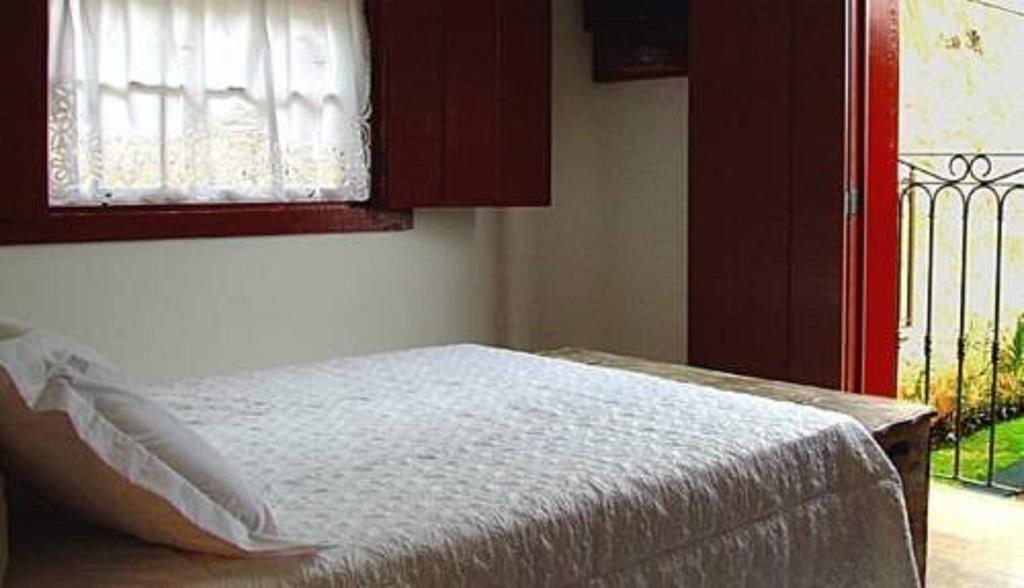Quarto Duplo com Cama de Casal