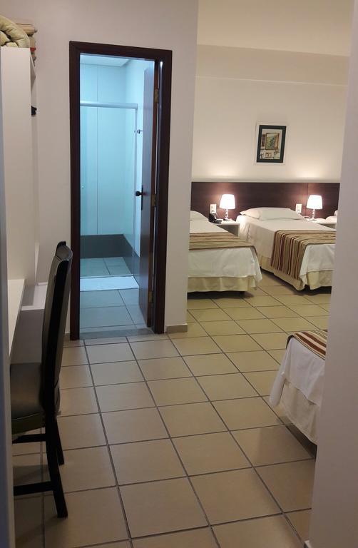 Quarto Quádruplo com Varanda