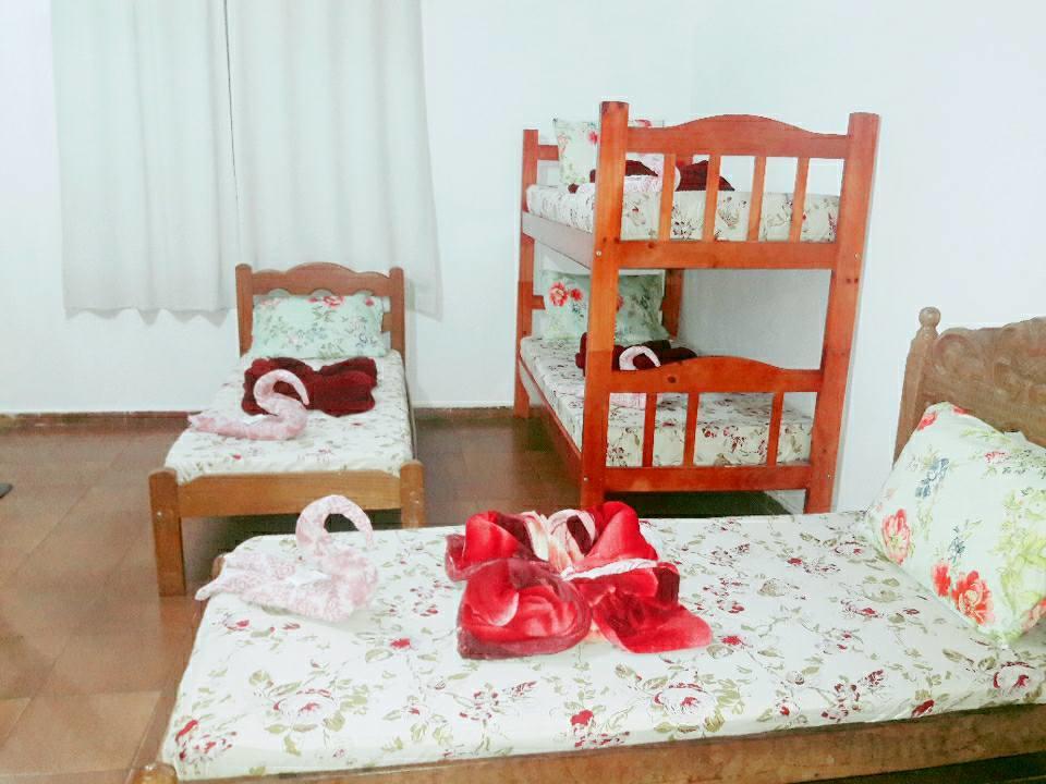 Cama em Dormitório Misto com 8 Camas