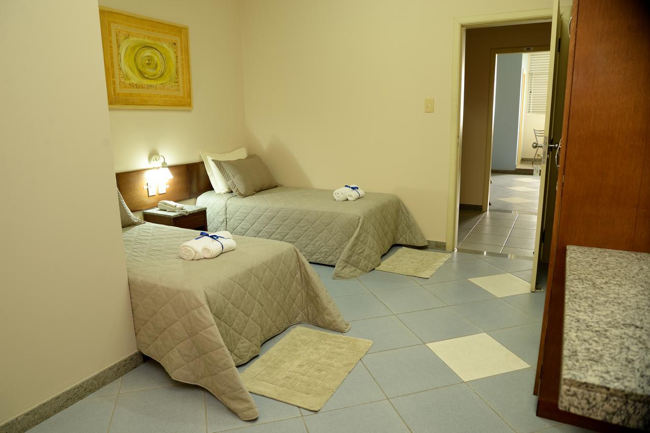 Quarto Triplo Executivo